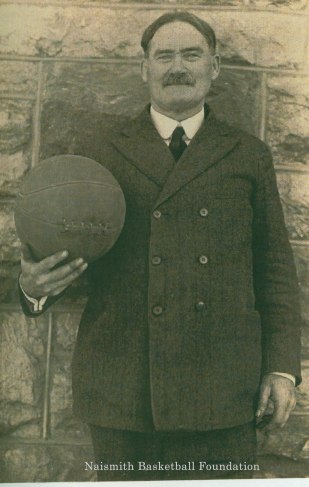 James Naismith with a basketball